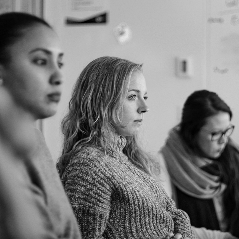 3 women listening in meeting